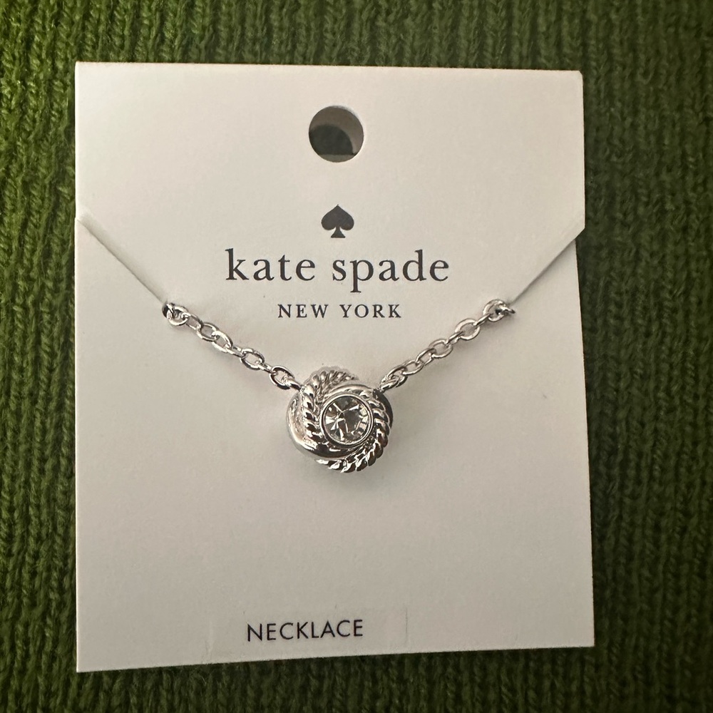 NWT Kate Spade Infinity and Beyond Knot Mini Pendant Necklace, Clear/silver